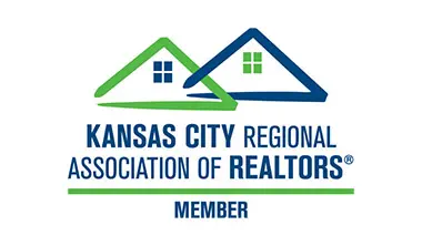 A logo for the kansas city regional association of realtors.